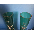 a pair of early 20th century German enemalled green glass vases