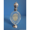 an antique crystal perfume bottle