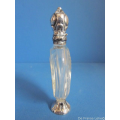 an antique crystal perfume bottle