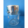 a crystal scent bottle with silver top