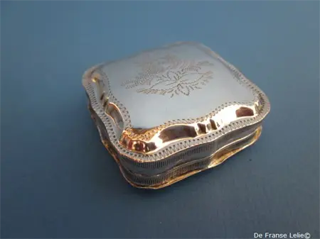 an antique Dutch silver engraved peppermint box
