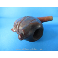 een antieke hand gestoken noten pijpenkop