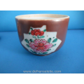 a Chinese famille rose brown glazed porcelain jar and cover
