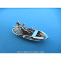 een vintage Hollands zilveren miniatuur roeiboot