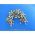 een vintage Italiaans 18 karaat gouden briljant bloem broche