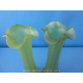 a pair of green glass Loetz tulip vases