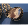een antiek vijfstrengs Hollands zilveren collier met zilveren slot