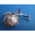 a vintage silver filigrain brooch