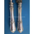 an antique French silver handled meat serving set