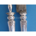 an antique French silver handled meat serving set