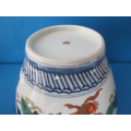 an antique Japanese imari porcelain vase and cover