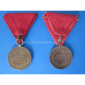 a pair of antique Austrian medals presenting Franc IOS 
