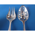 an antique Dutch silver ginger spoon and fork