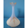 an antique French opaline glass vase