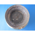 an antique Indonesian brass bowl