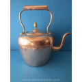 an antique Victorian copper tea kettle 