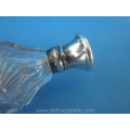 an antique Dutch crystal scent bottle with silver top and stand