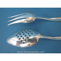 an antique Dutch silver ginger fork and spoon