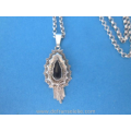 an antique Dutch silver necklace pendant