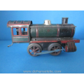 an antique tinplate locomotive