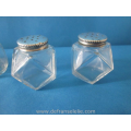 a small collection of vintage glass salts with silver top