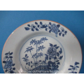 an antique Chinese blue and white porcelain dish