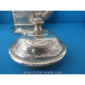an antique Indonesian brass kettle