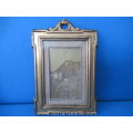 a pair of antique French gilt picture frames