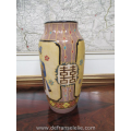 a vintage polychrome earthenware vase