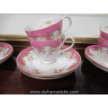 a set of ten antique French porcelain cups and saucers