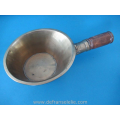 a vintage Chinese bronze grain scoop with wooden handle