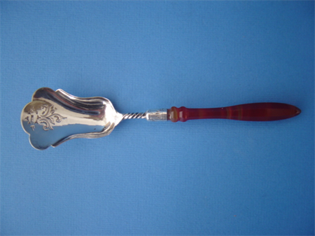 an antique Dutch silver sugar spoon with agate handle