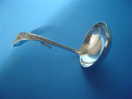a vintage Dutch silver cream spoon