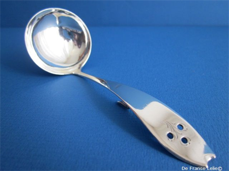 an early 20th century Dutch silver cream spoon