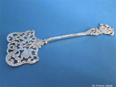 an openworked Dutch silver pastry serving scoop