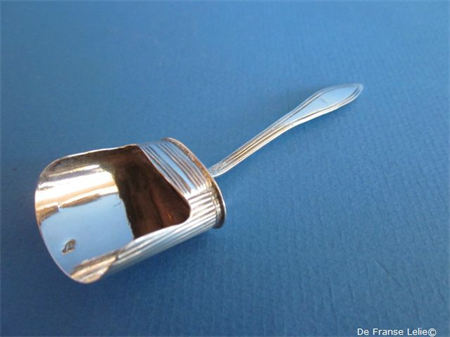 an antique Dutch silver tea shovel spoon