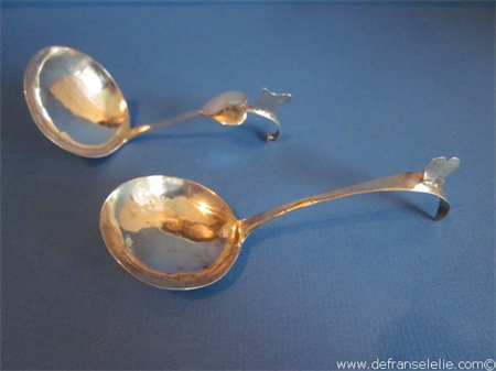 two antique Dutch silver cream spoons