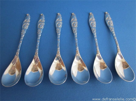 a set of six Dutch silver tea spoons with a floral decoration