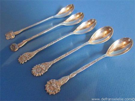 a set of six Dutch silver tea spoons with a floral decoration