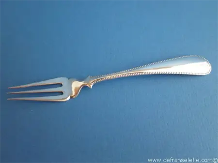 an antique Dutch silver meat serving fork