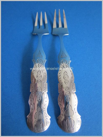an antique pair of Dutch silver meat forks