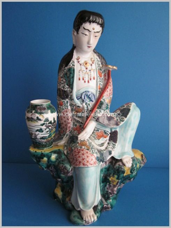 an antique Japanese Kutani porcelain figure