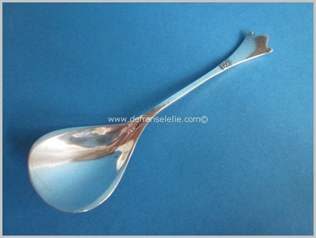 an antique Dutch silver art deco sugar spoon