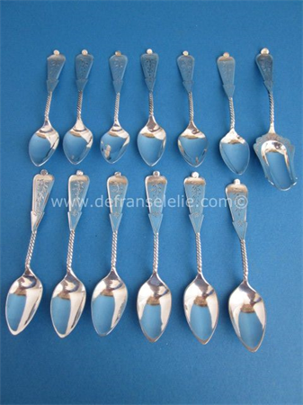 a set of twelve Dutch silver teaspoons incl sugar spoon