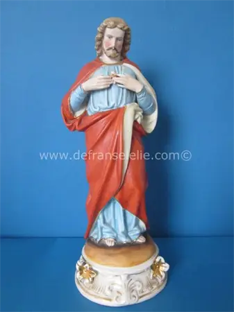 / een antiek biscuit porceleinen beeld Jezus