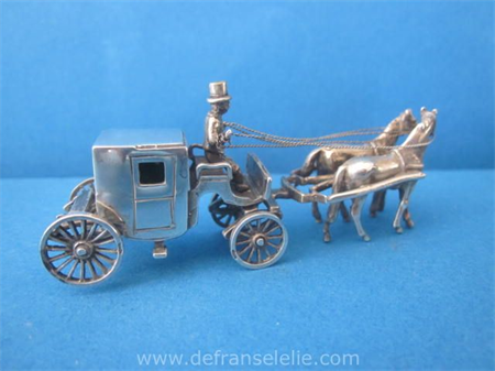a vintage Dutch silver miniature stagecoach
