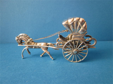 a vintage Dutch silver horse carriage