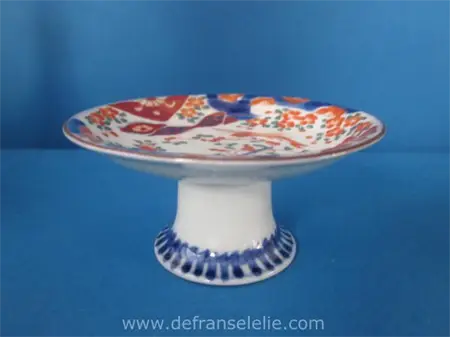 an antique Japanese imari porcelain stand