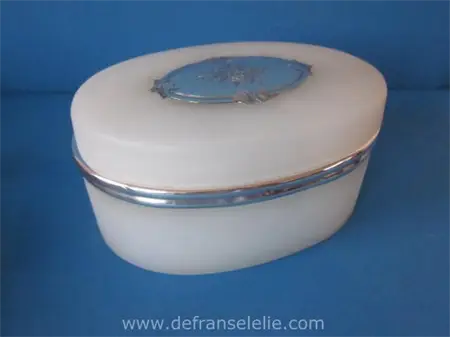 an antique French opaline biscuit box with silver mountings