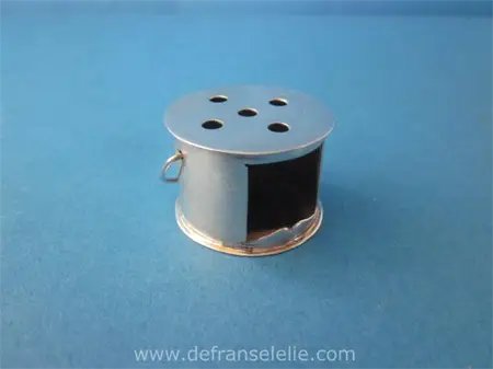 a vintage Dutch silver miniature stove